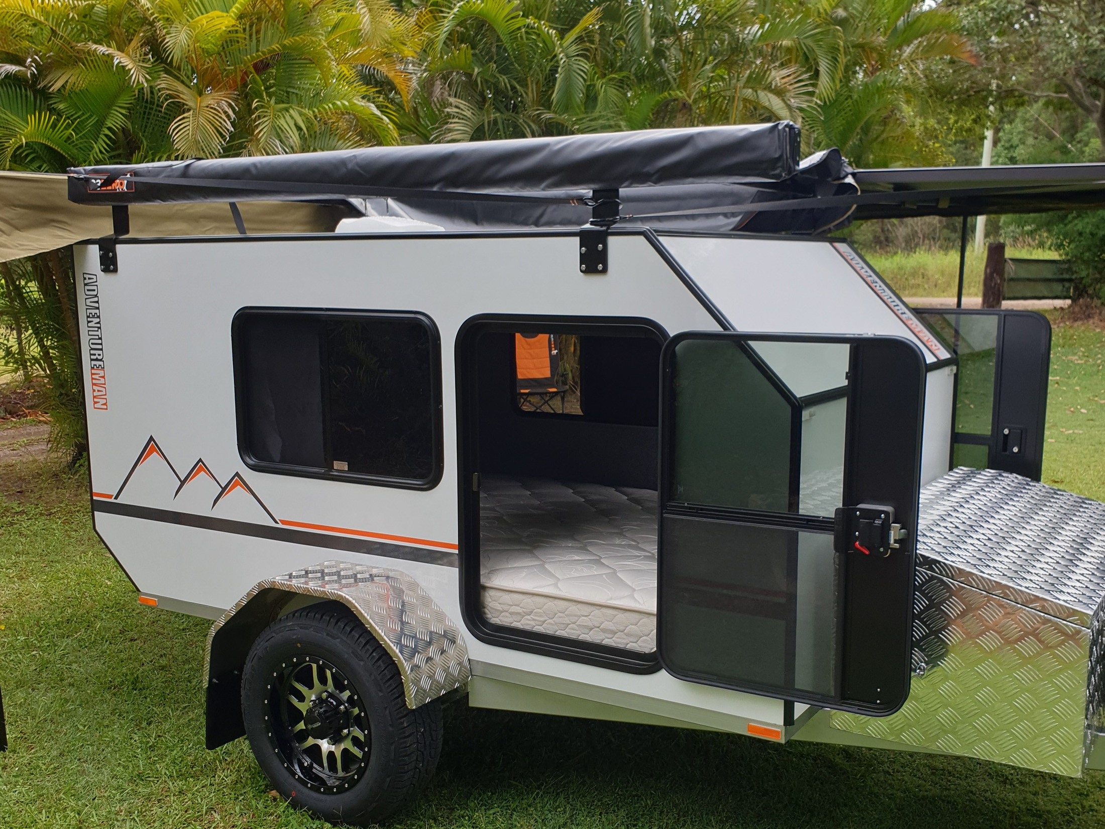 Treka Teardrop Camper pod with queen bed two big doors AdventureMan